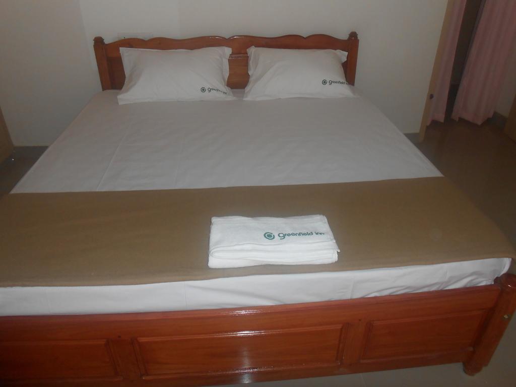 טריואנדרום Greenfield Inn חדר תמונה