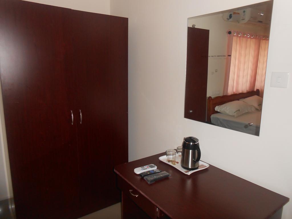 טריואנדרום Greenfield Inn חדר תמונה